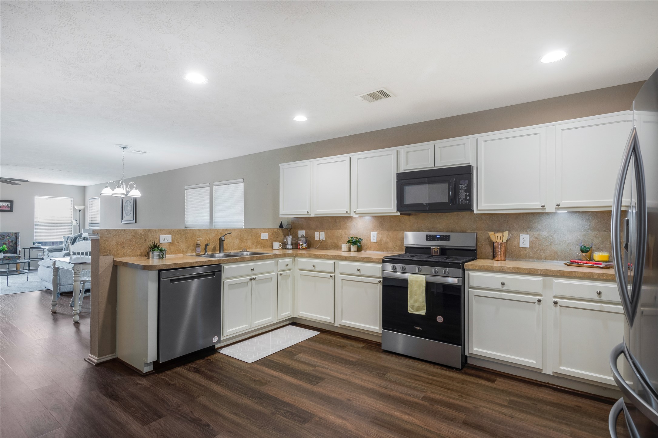 16306 Rustic Stable Lane Cypress, TX 77429 - Photo 2 of 32 The heart of the home is the kitchen! Look at all of the counter and cabinet space!!