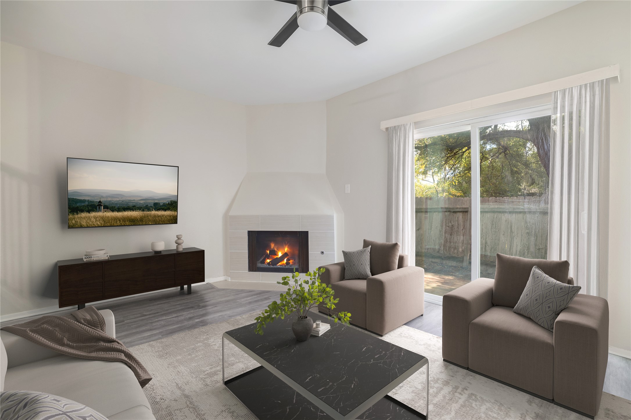 11404 Walnut Ridge Drive, Unit 4 Austin, TX 78753 - Photo 2 of 15 a living room with furniture and a fireplace