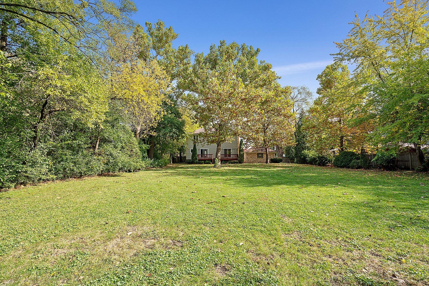 2134 Shermer Road Northbrook, IL 60062 - Photo 19 of 20 a view of a field with trees in the background