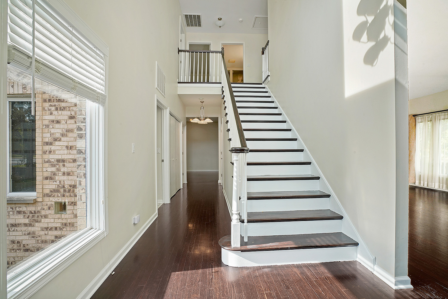 2134 Shermer Road Northbrook, IL 60062 - Photo 3 of 20 a view of a room with wooden floor and windows