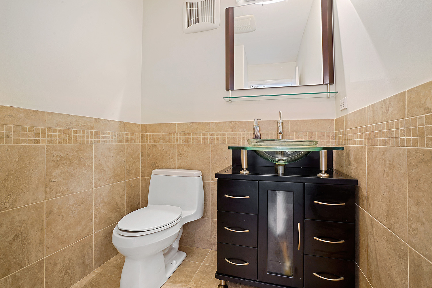 2134 Shermer Road Northbrook, IL 60062 - Photo 5 of 20 a bathroom with a toilet and a sink