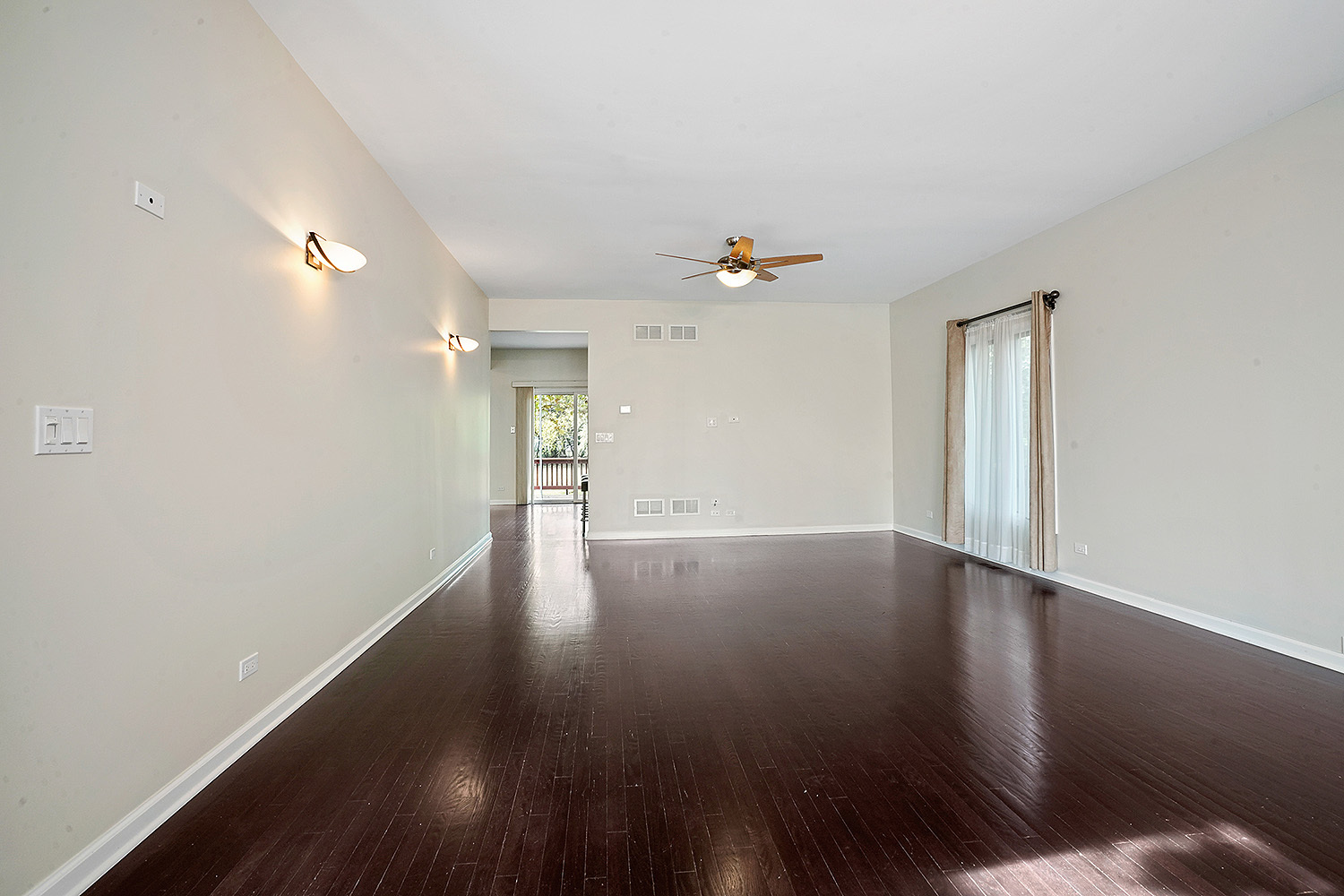 2134 Shermer Road Northbrook, IL 60062 - Photo 10 of 20 wooden floor in an empty room with a window