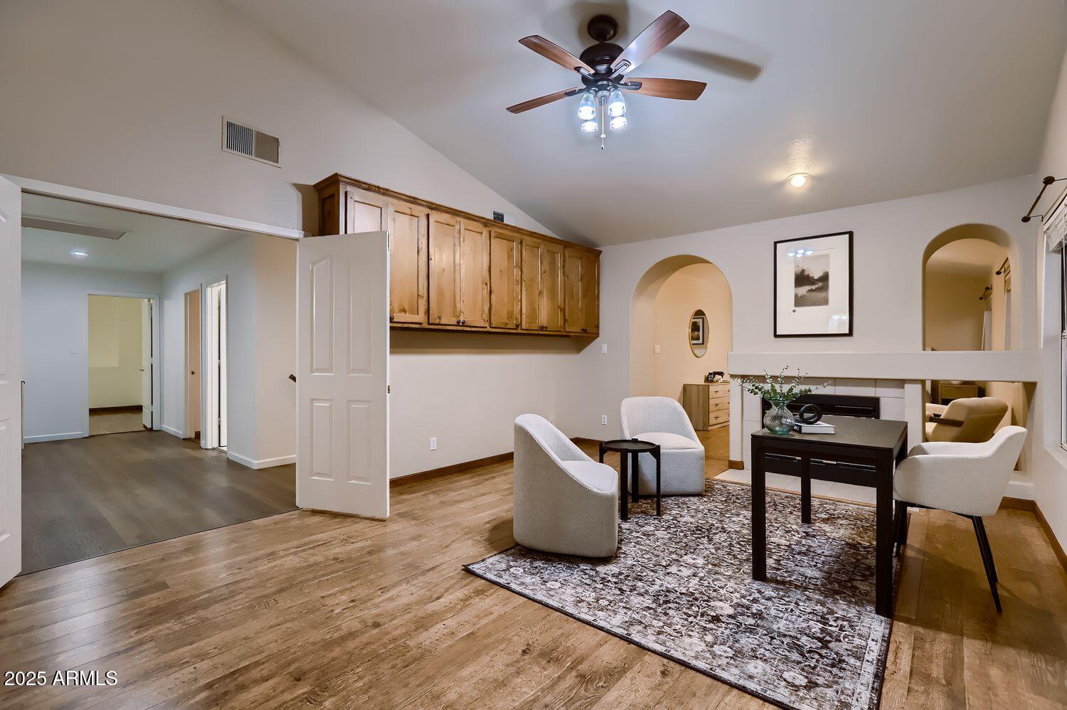 761 East Mountain Sky Avenue Phoenix, AZ 85048 - Photo 17 of 28 a living room with furniture and wooden floor
