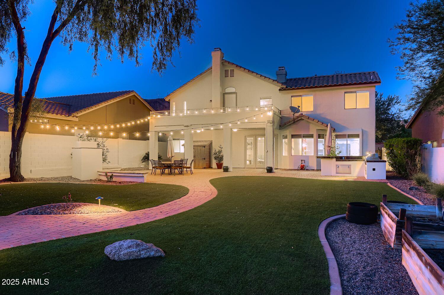 761 East Mountain Sky Avenue Phoenix, AZ 85048 - Photo 2 of 28 a view of outdoor space yard deck patio and outdoor kitchen