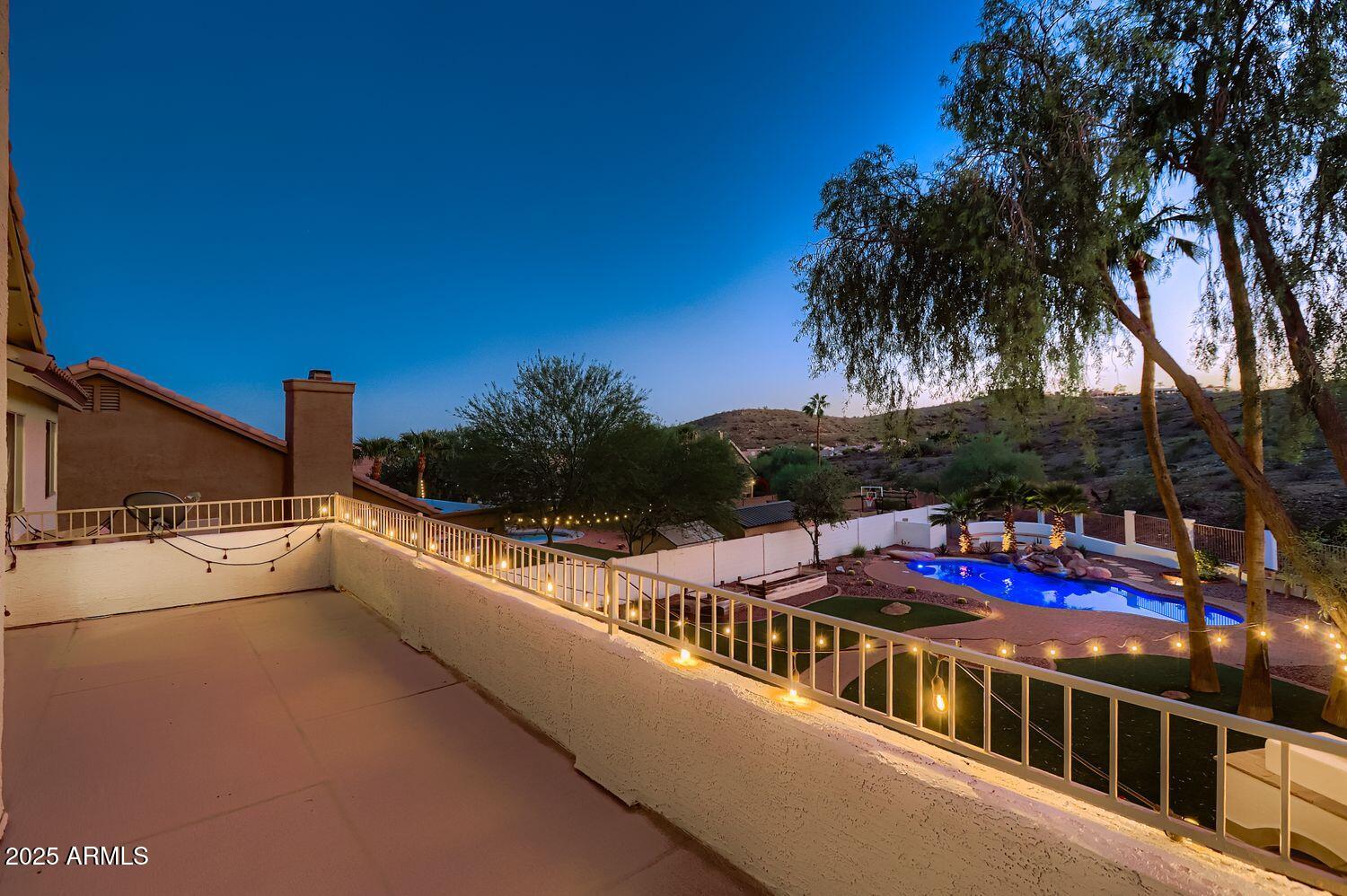 761 East Mountain Sky Avenue Phoenix, AZ 85048 - Photo 25 of 28 a view of city from balcony with outdoor seating
