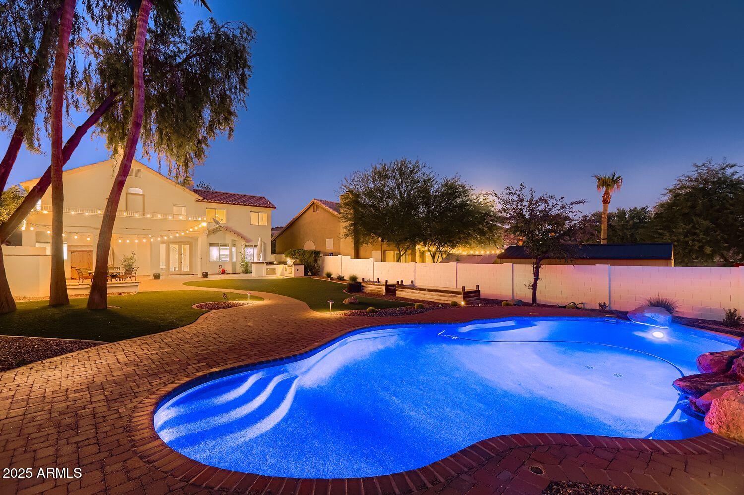 761 East Mountain Sky Avenue Phoenix, AZ 85048 - Photo 3 of 28 a view of swimming pool with outdoor seating