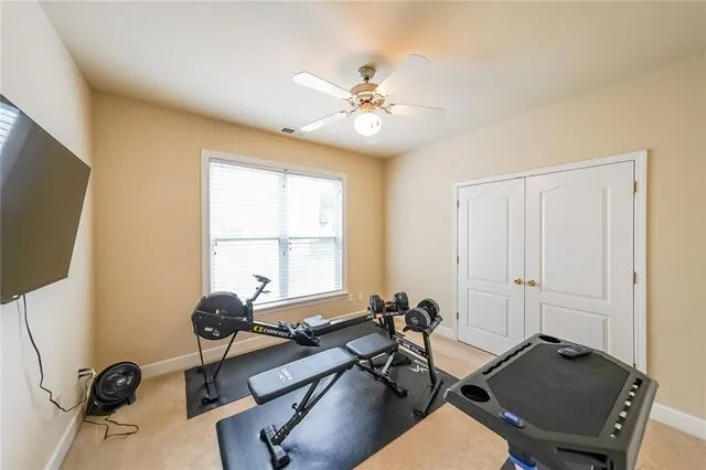 a bathroom with a toilet a sink and a mirror
