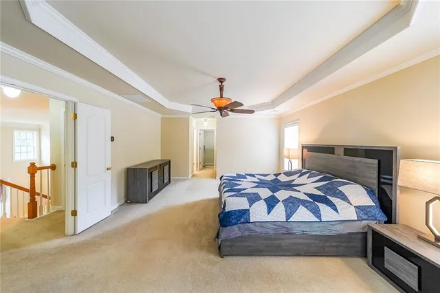 a bathroom with a tub shower and sink