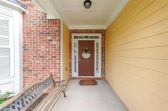 a view of living room kitchen and dining room