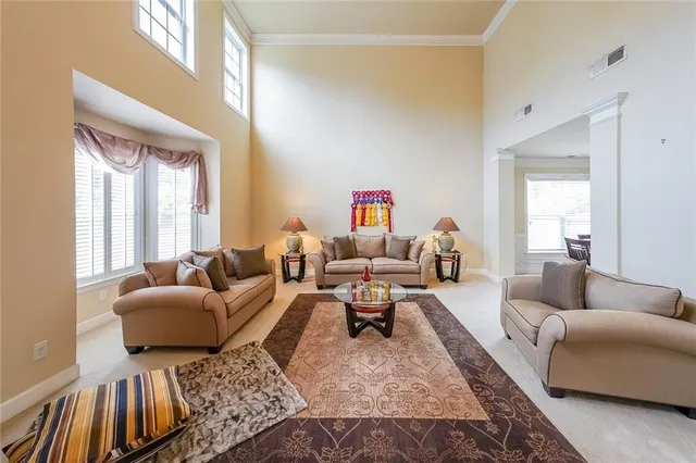 a living room with furniture and a couch