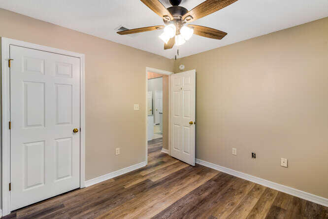 122 Bayou Landing Road Miramar Beach, FL 32550 - Photo 18 of 27 a view of a livingroom with a chandelier fan