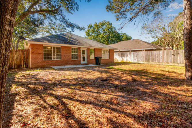 122 Bayou Landing Road Miramar Beach, FL 32550 - Photo 25 of 27 a front view of a house with a yard