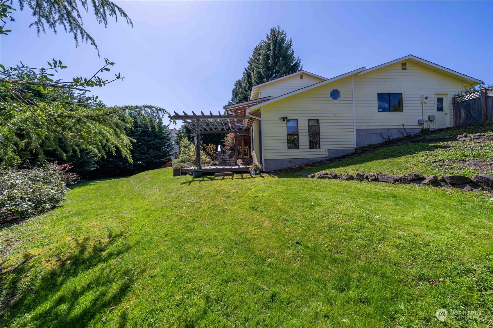 414 169th Street Southeast Bothell, WA 98012 - Photo 21 of 24 a front view of a house with garden