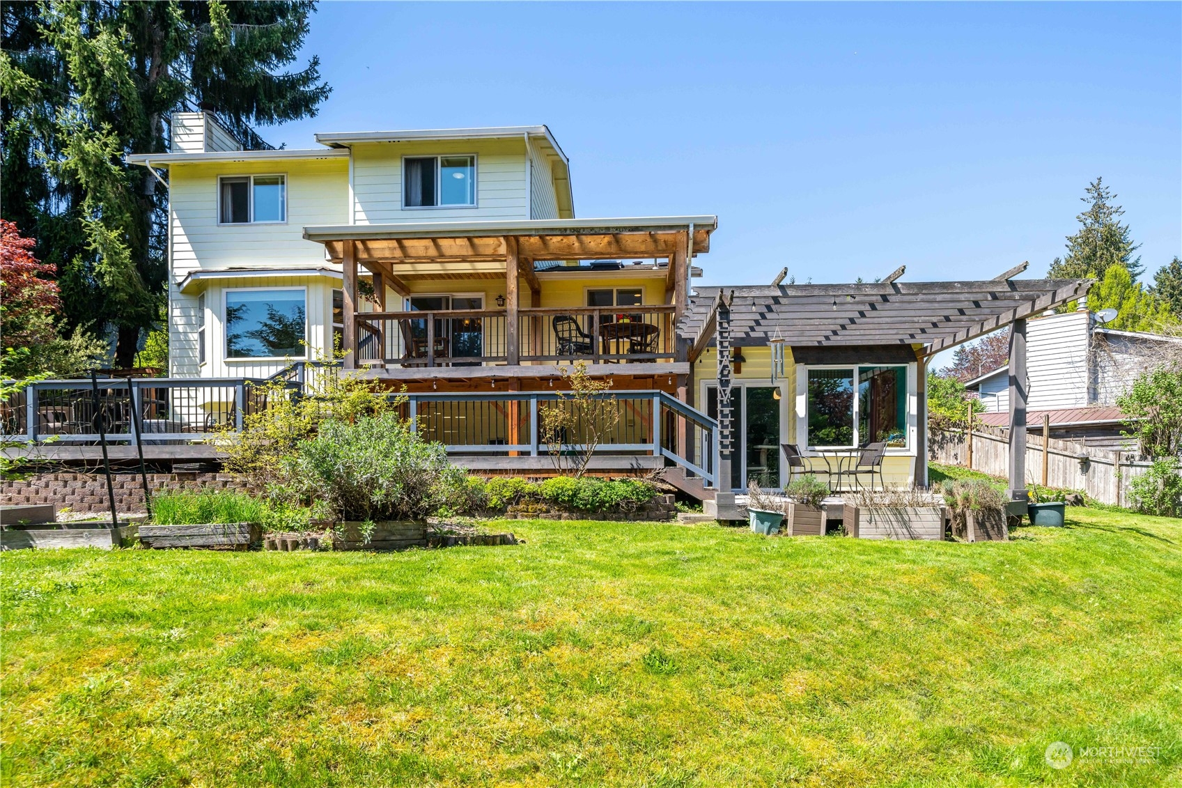414 169th Street Southeast Bothell, WA 98012 - Photo 22 of 24 a front view of house with yard and seating area