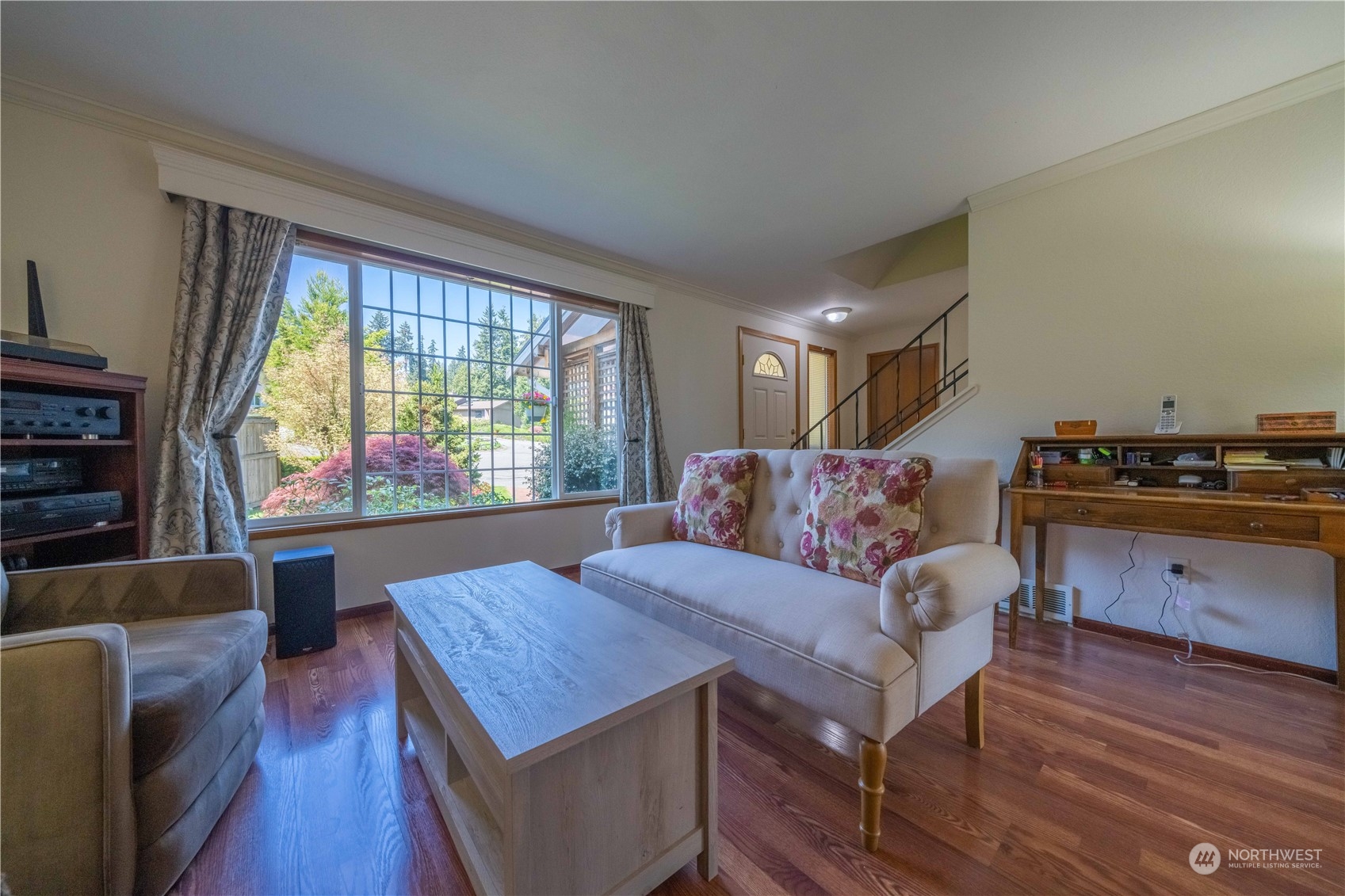 414 169th Street Southeast Bothell, WA 98012 - Photo 5 of 24 a living room with furniture and a large window