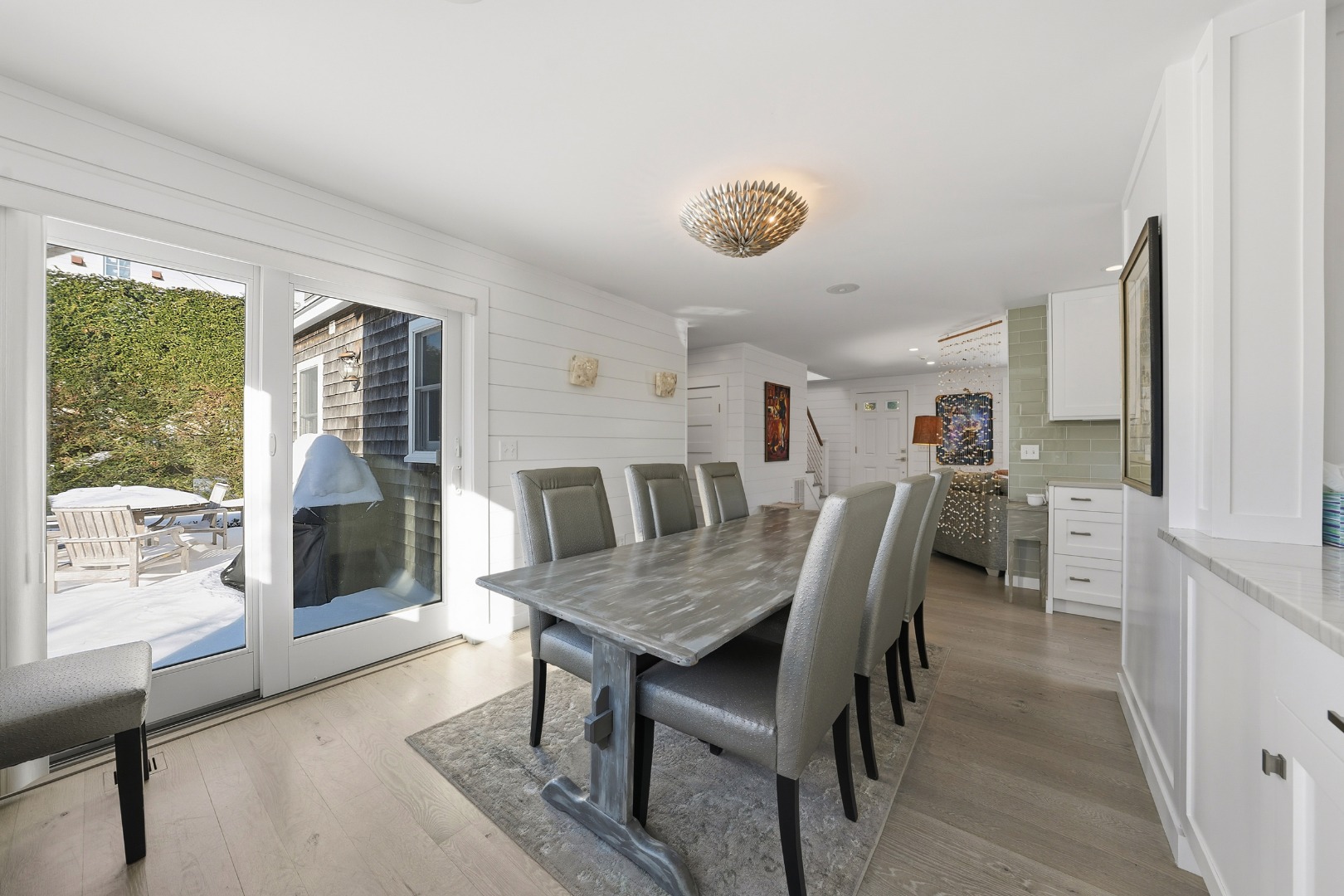 10 Pilgrim Road Nantucket, MA 02554 - Photo 15 of 65 a view of a dining room with furniture window and outside view