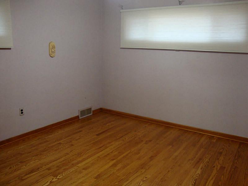 78 Bellview Circle McKees Rocks, PA 15136 - Photo 8 of 22 Bedroom. The 3rd bedroom is on the middle level of home, has refinished floors, new windows and treatments.