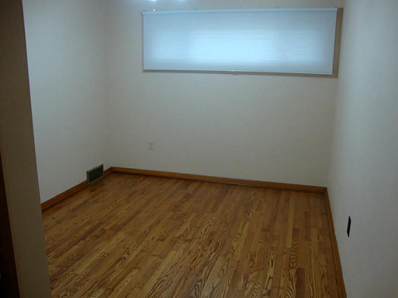 78 Bellview Circle McKees Rocks, PA 15136 - Photo 9 of 22 Bedroom. The 5th bedroom is located on the middle level of home, has new windows, treatments and refinished floors.