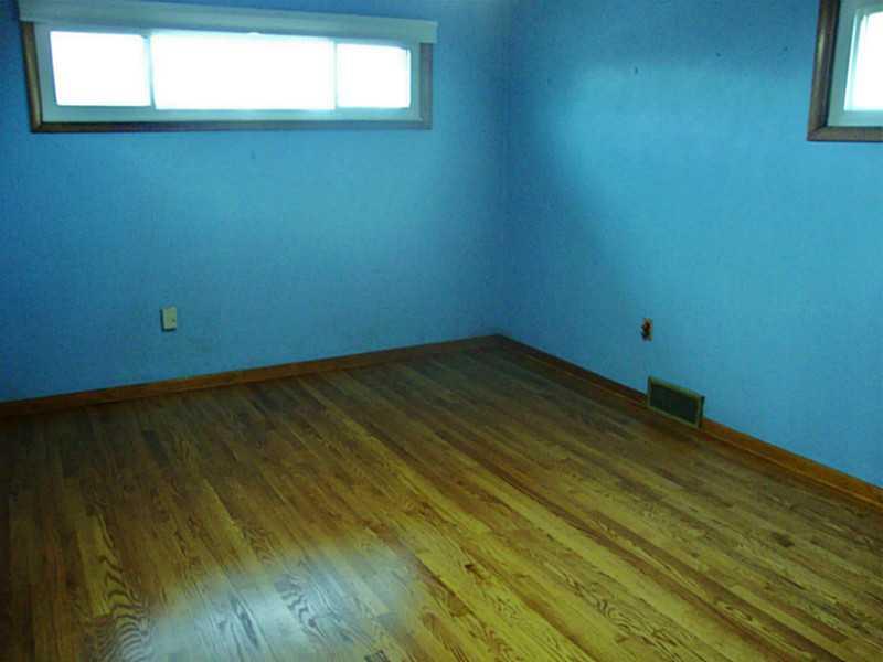 78 Bellview Circle McKees Rocks, PA 15136 - Photo 10 of 22 Bedroom. The 2nd bedroom is located on the middle level of the home & has refinished hard wood floors and new energy saving windows & treatments.
