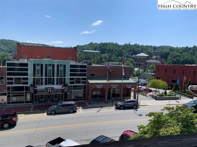a car parked in front of a house