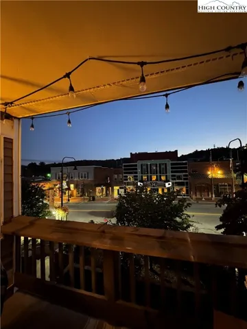 a view of a street with sitting area