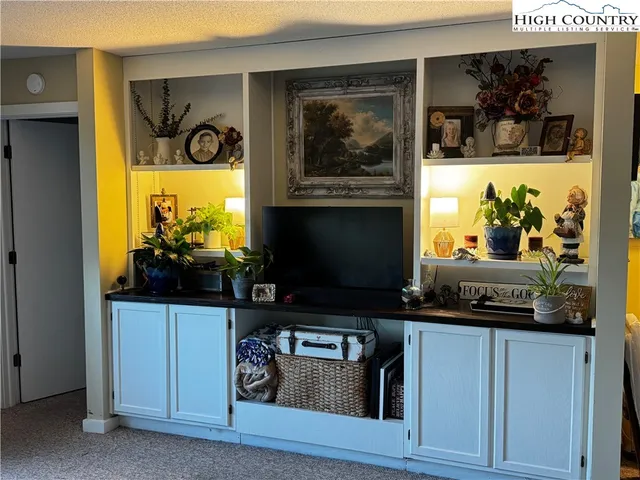a kitchen with a stove and a microwave