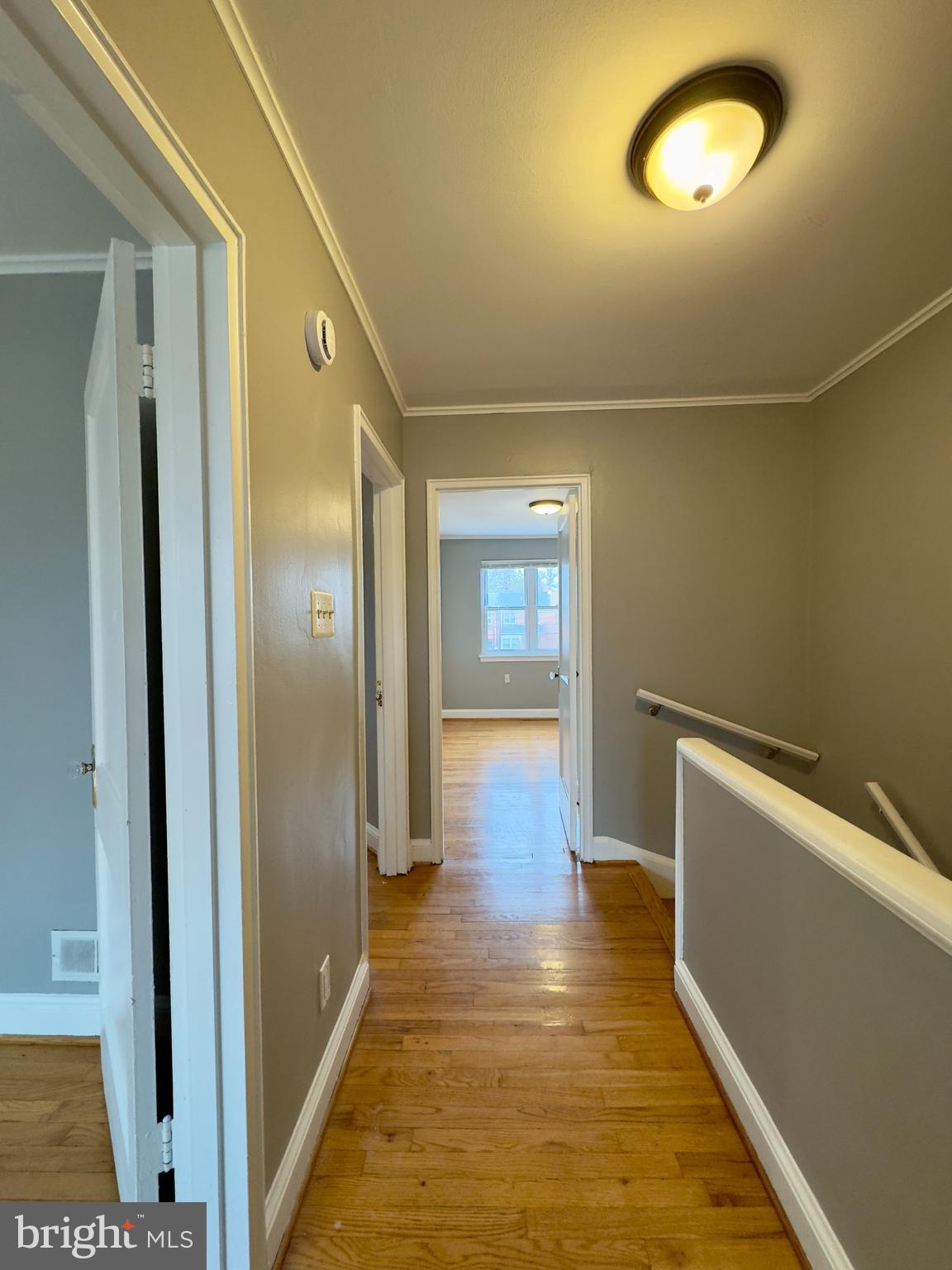 820 Bradhurst Road Baltimore, MD 21212 - Photo 7 of 20 a view of livingroom with hardwood floor and front door