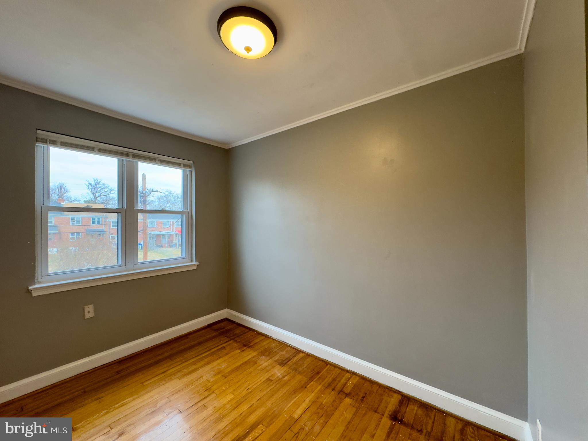 820 Bradhurst Road Baltimore, MD 21212 - Photo 9 of 20 an empty room with a window