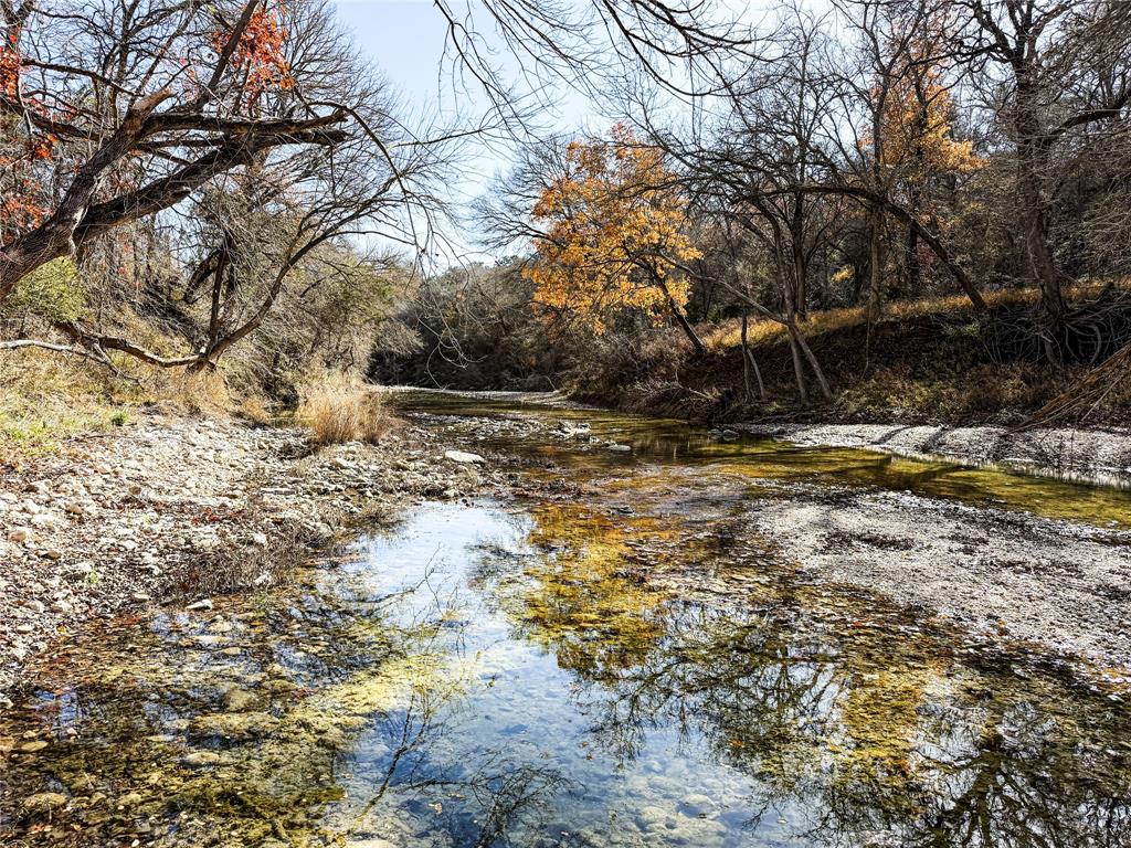 3748 High Prairie Road Valley Mills, TX 76689 - Photo 2 of 21 a view of a yard with a tree