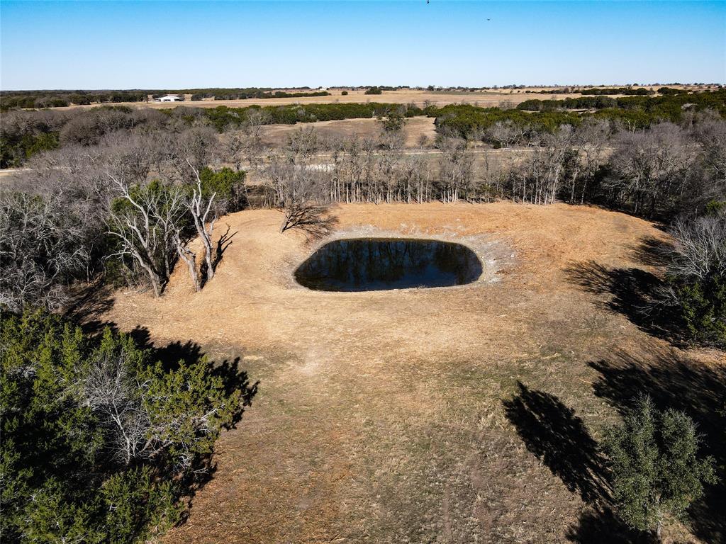 3748 High Prairie Road Valley Mills, TX 76689 - Photo 6 of 21 a view of a lake with houses in the back