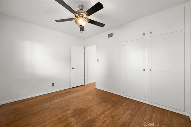 a view of swimming pool with outdoor seating and plants