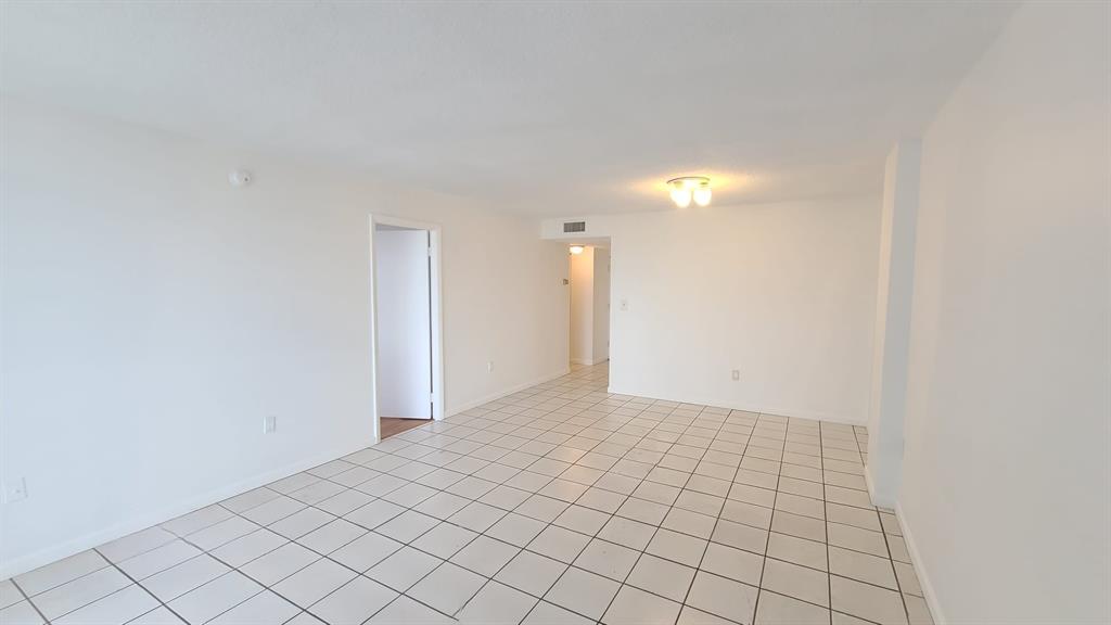 15600 Northwest 7th Avenue, Unit 606 Miami, FL 33169 - Photo 2 of 13 a view of an empty room