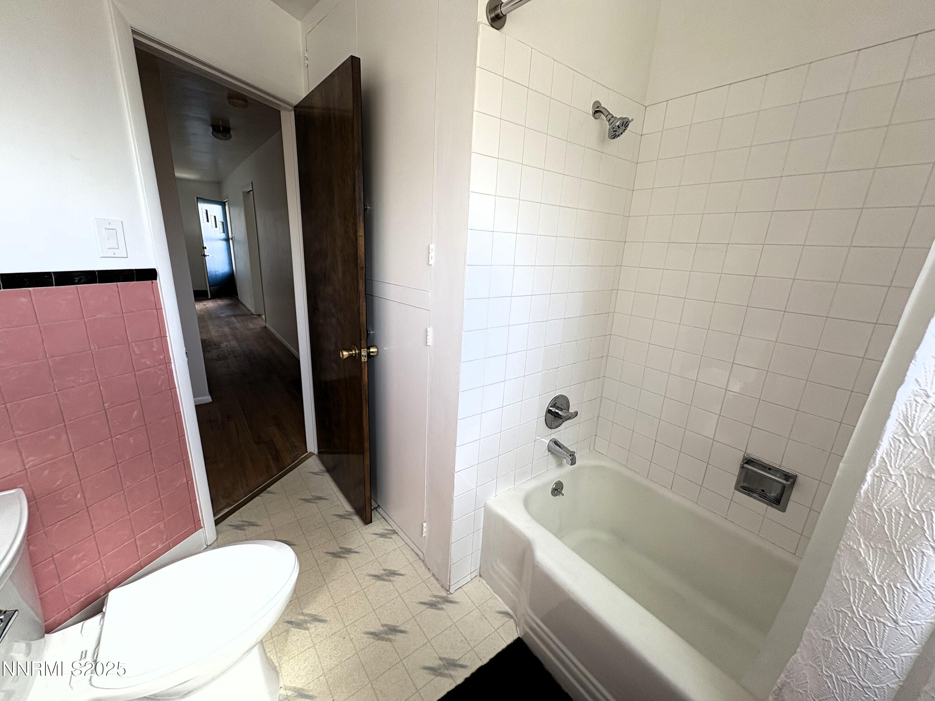 230 Glenmanor Drive Reno, NV 89509 - Photo 17 of 28 a bathroom with a sink a toilet and shower