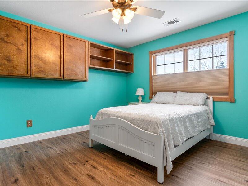 24140 Deertrail Drive Tehachapi, CA 93561 - Photo 14 of 44 a bedroom with a bed and a window