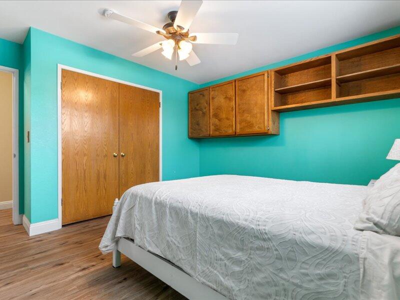 24140 Deertrail Drive Tehachapi, CA 93561 - Photo 15 of 44 a bedroom with a bed and a window