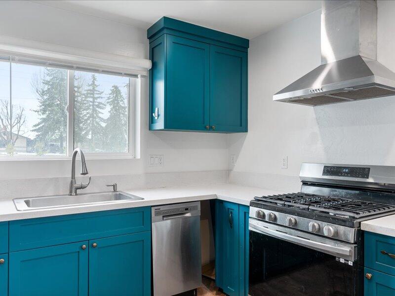 24140 Deertrail Drive Tehachapi, CA 93561 - Photo 25 of 44 a kitchen with a sink stove and cabinets