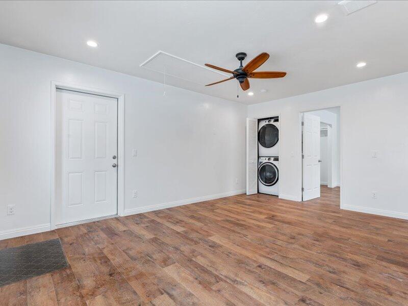 24140 Deertrail Drive Tehachapi, CA 93561 - Photo 26 of 44 a view of a room with a ceiling fan and wooden floor