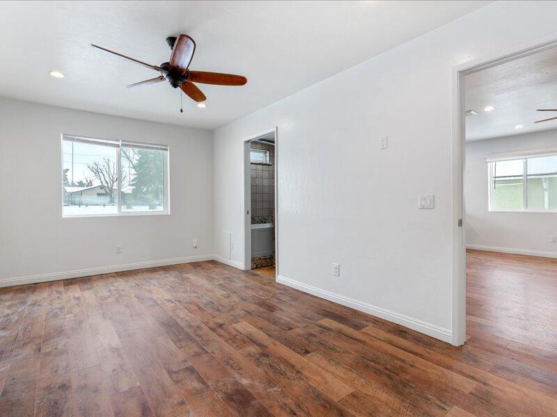 24140 Deertrail Drive Tehachapi, CA 93561 - Photo 27 of 44 a view of empty room with wooden floor and fan