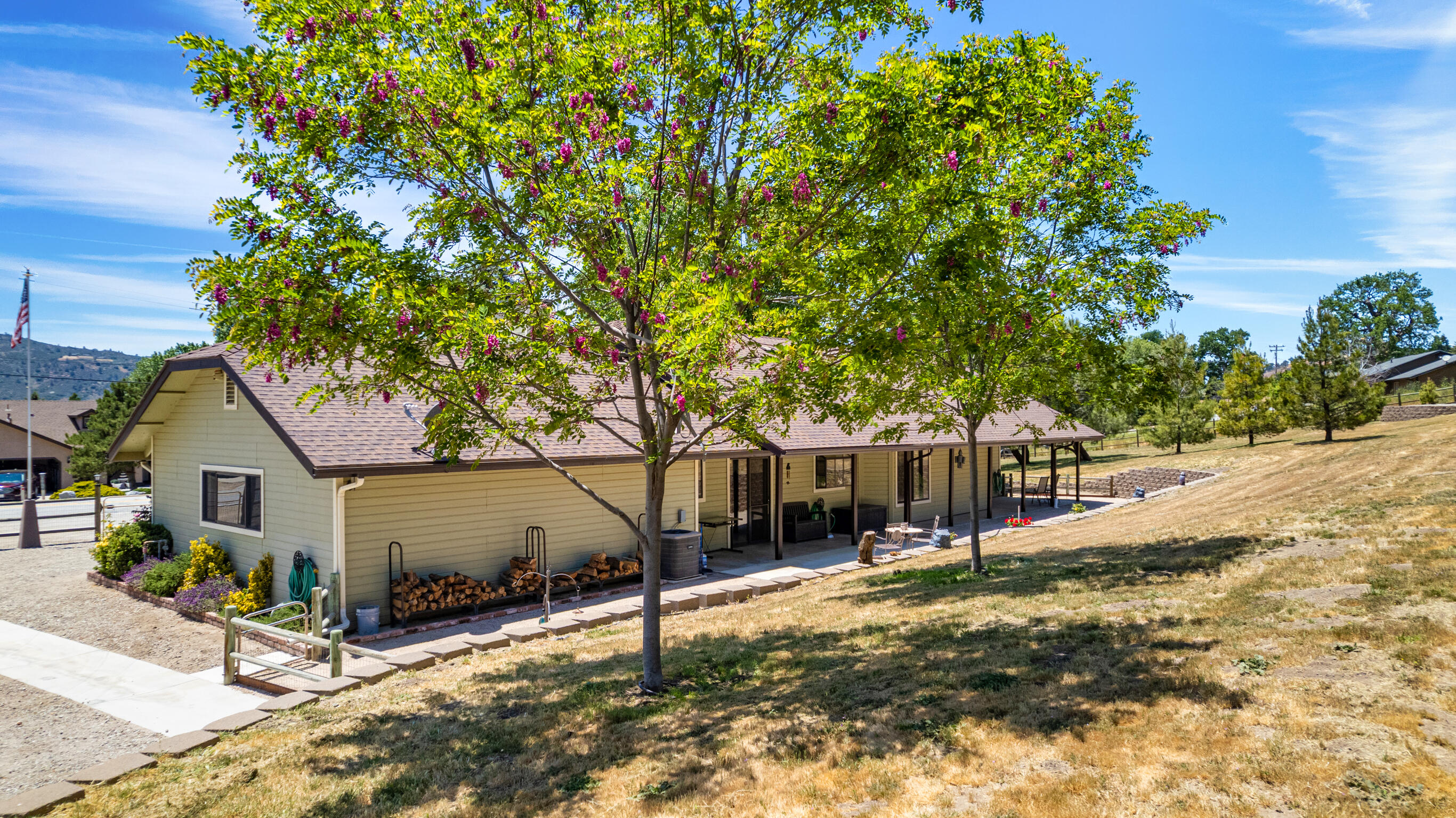 24140 Deertrail Drive Tehachapi, CA 93561 - Photo 37 of 44 a view of a house with a yard
