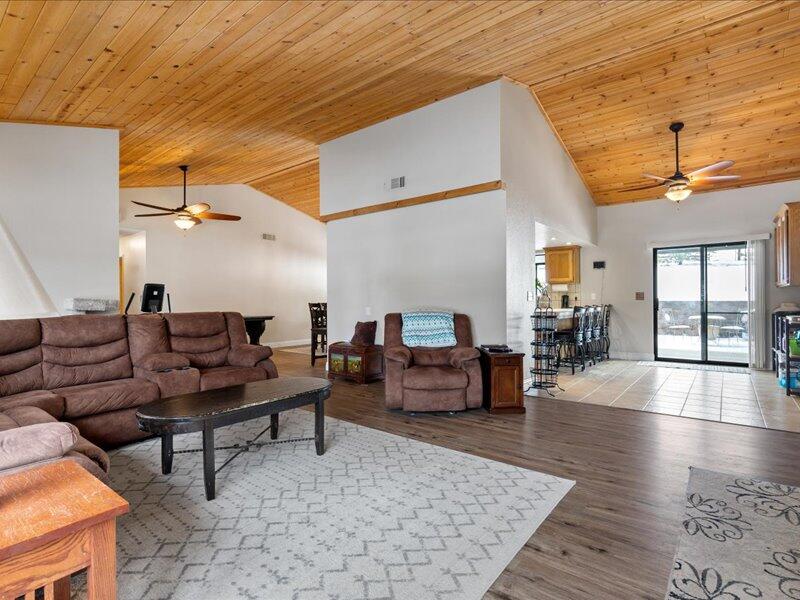 24140 Deertrail Drive Tehachapi, CA 93561 - Photo 8 of 44 a living room with furniture and wooden floor