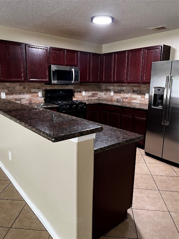 18510 Ranch View Trail Houston, TX 77073 - Photo 3 of 6 a kitchen with granite countertop wooden cabinets a granite counter and a stove top oven