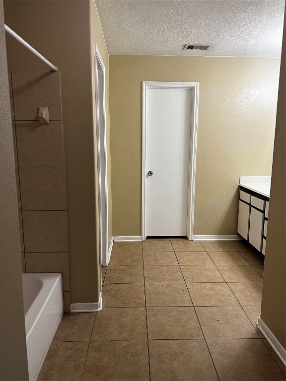 18510 Ranch View Trail Houston, TX 77073 - Photo 5 of 6 a bathroom with a bathtub and toilet