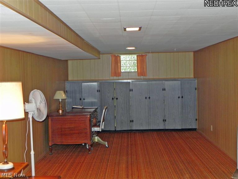 10000 West Pleasant Valley Road Cleveland, OH 44130 - Photo 17 of 22 And plenty of space for an office, or card table to pool table or play area for the children. Glass block windows add light and protection.