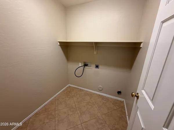 a view of a room with rack on the wall