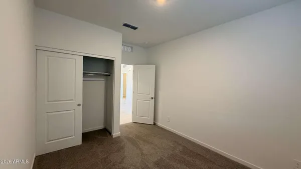 an empty room with closet