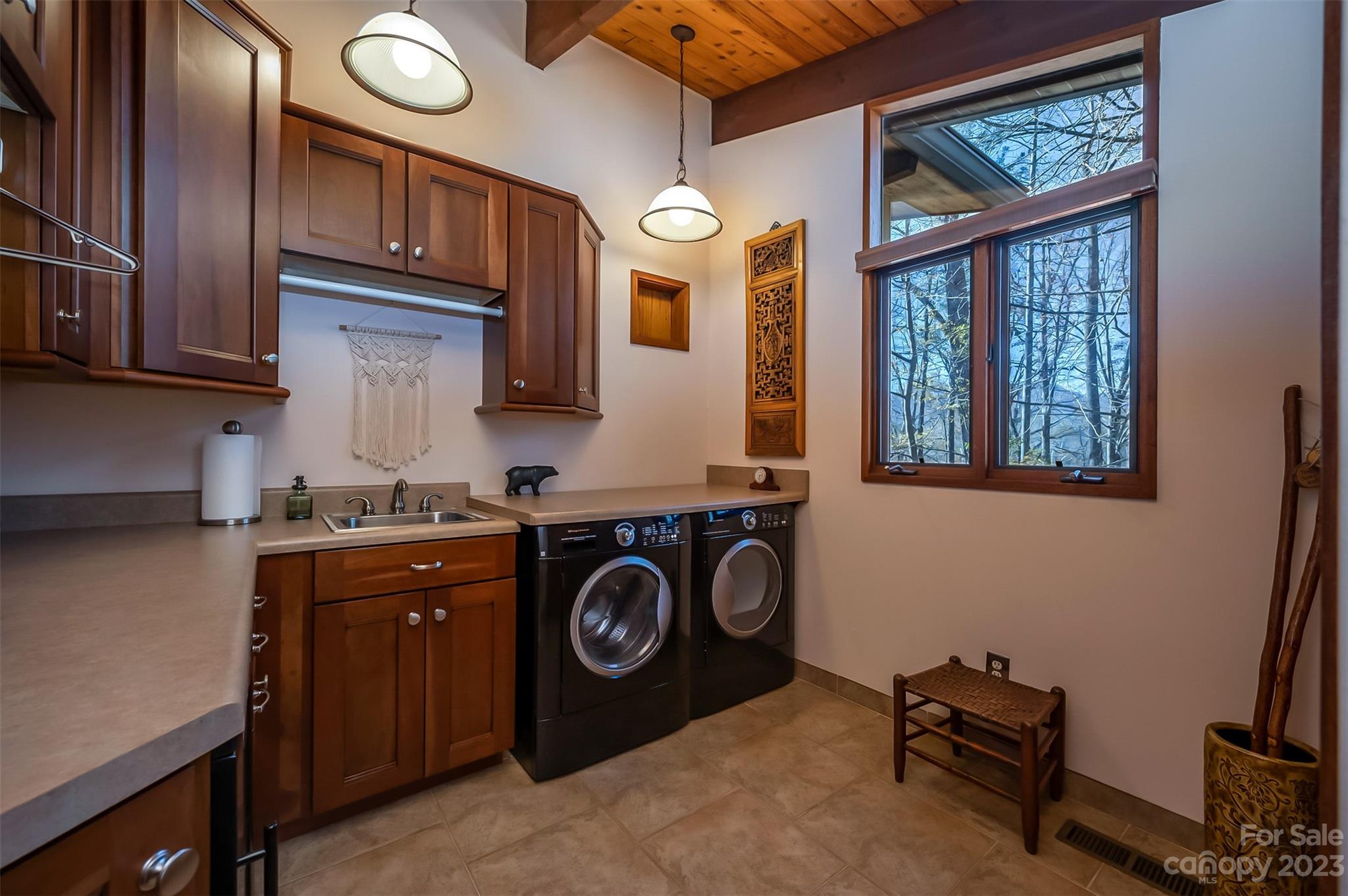 548 Howard Gap Road Tryon, NC 28782 - Photo 12 of 48 a kitchen with a stove and a sink