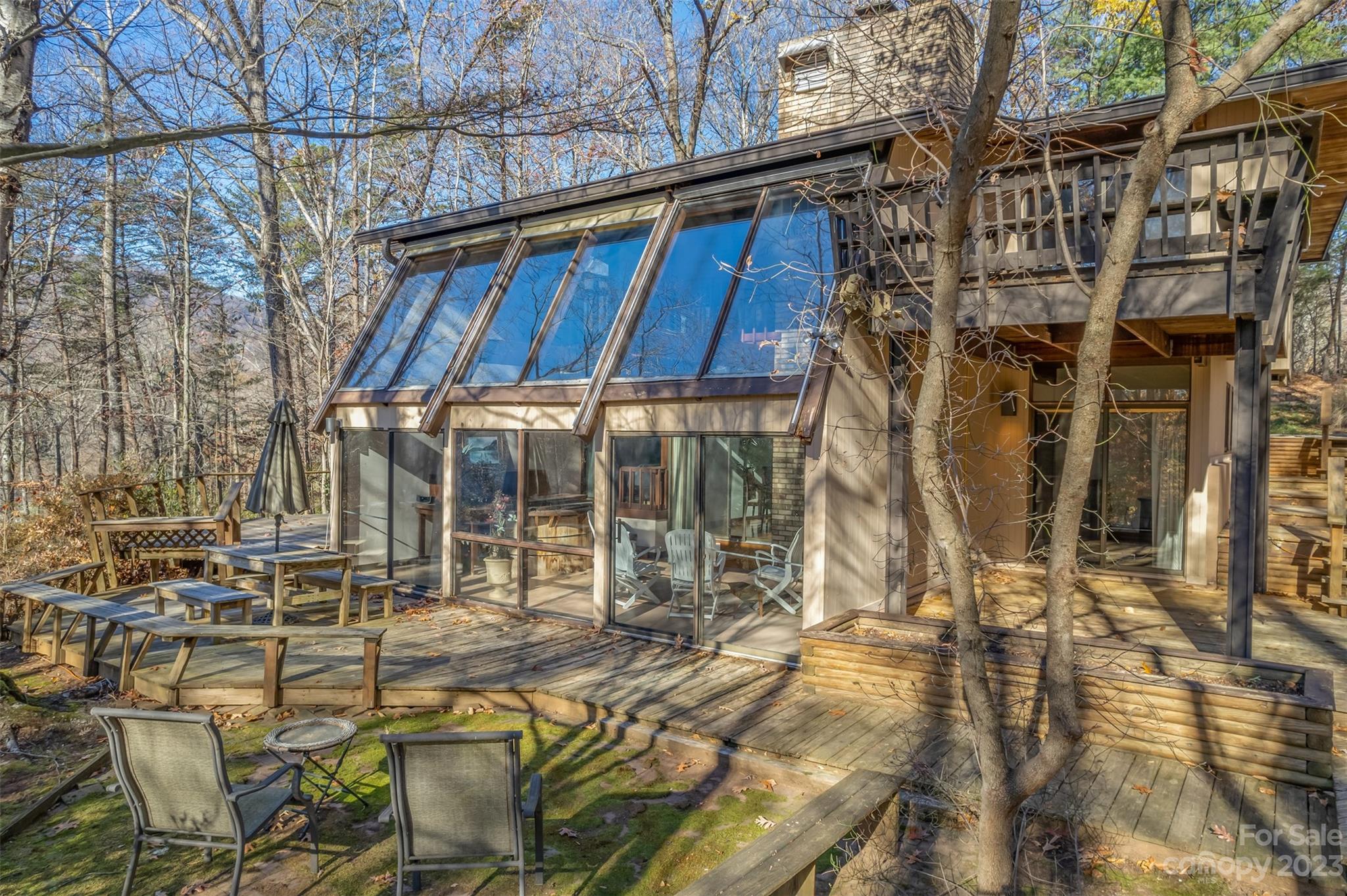 548 Howard Gap Road Tryon, NC 28782 - Photo 2 of 48 a view of yard with outdoor seating
