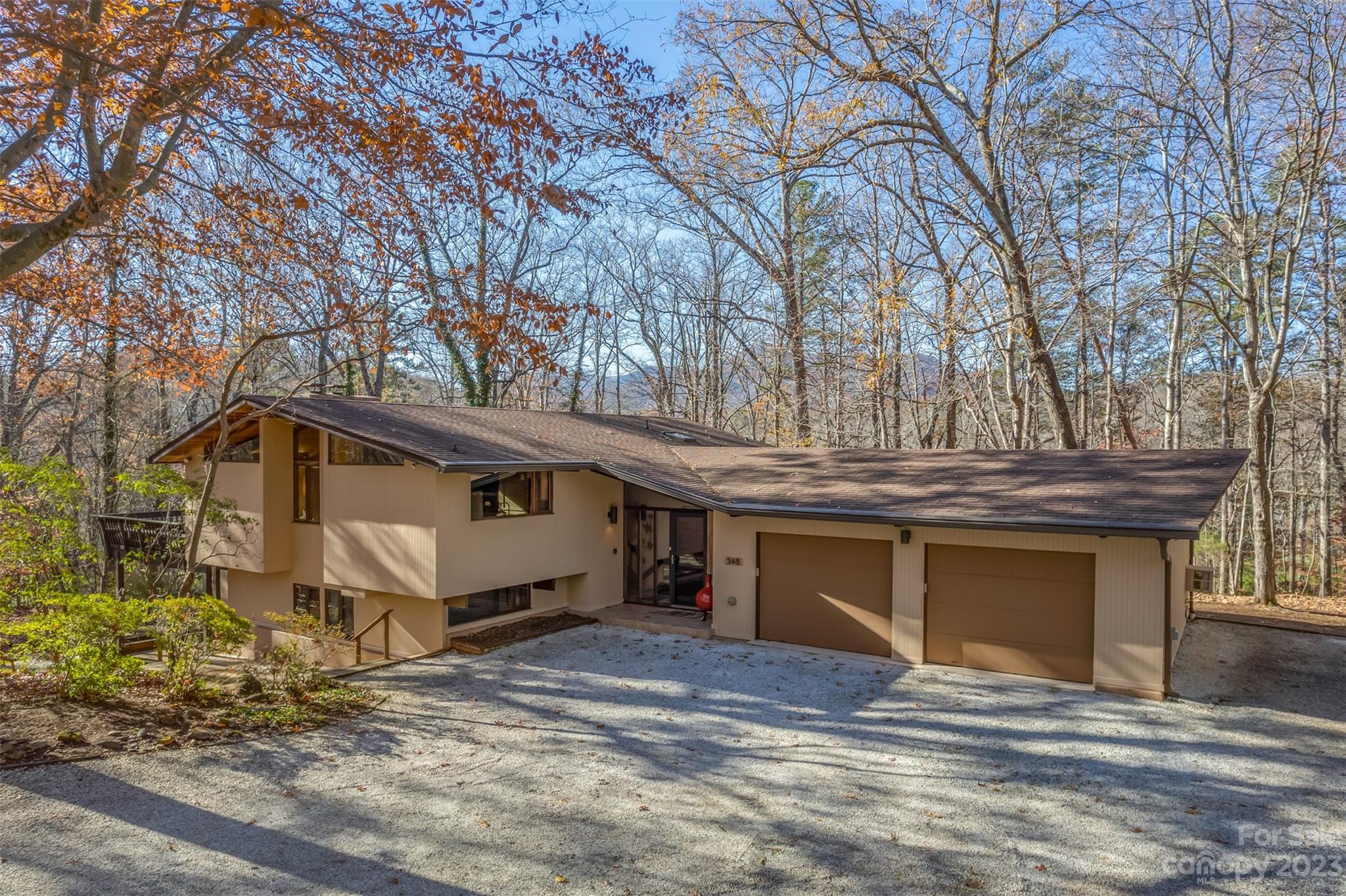 548 Howard Gap Road Tryon, NC 28782 - Photo 5 of 48 a view of a house with a yard and large tree