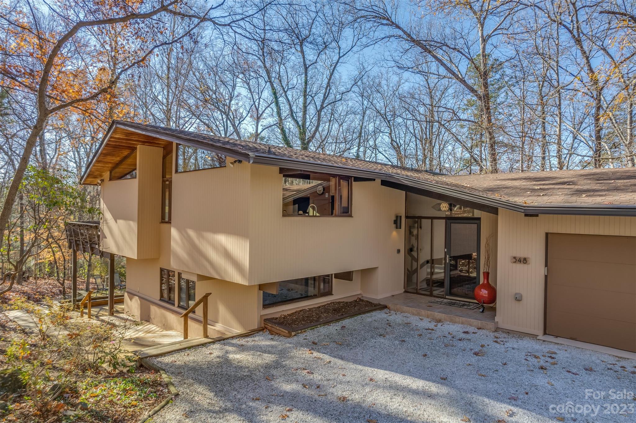 548 Howard Gap Road Tryon, NC 28782 - Photo 7 of 48 a view of a house with a yard