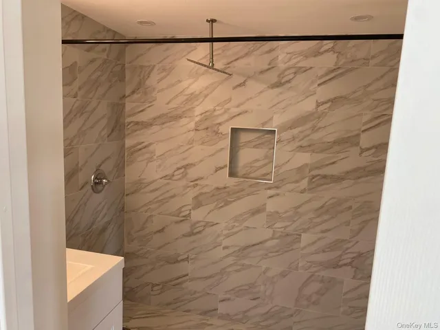 a bathroom with a shower curtain